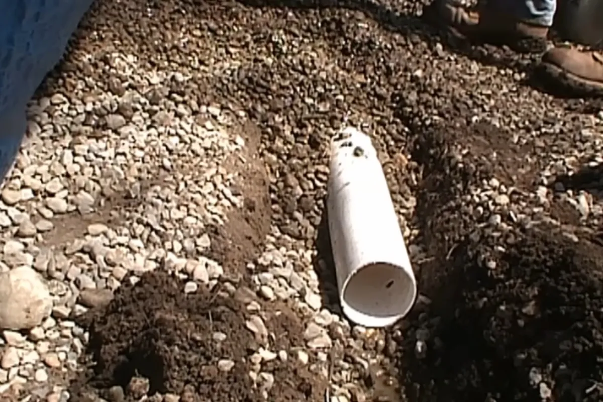 New PVC sewer lateral on stone bedding during a sewer line replacement in Roswell, GA