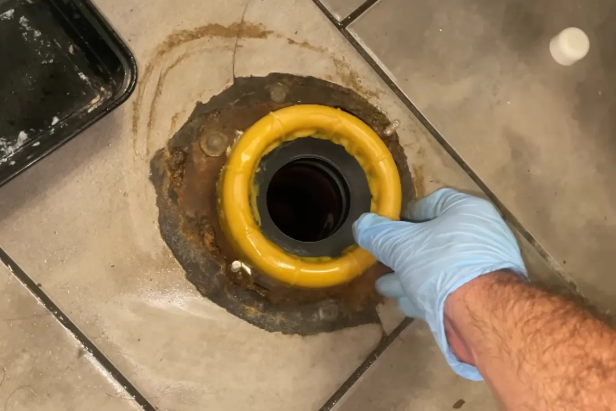 New wax ring and flange during a toilet repair in Roswell, GA